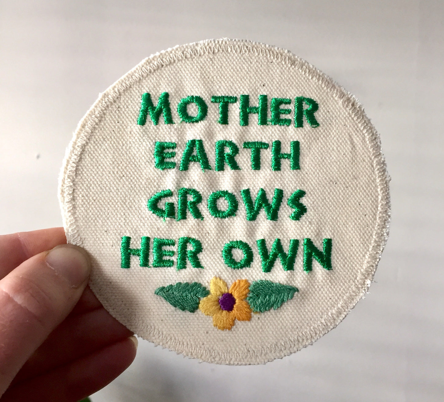 Mother Earth Grows Her Own. Embroidered Canvas Patch