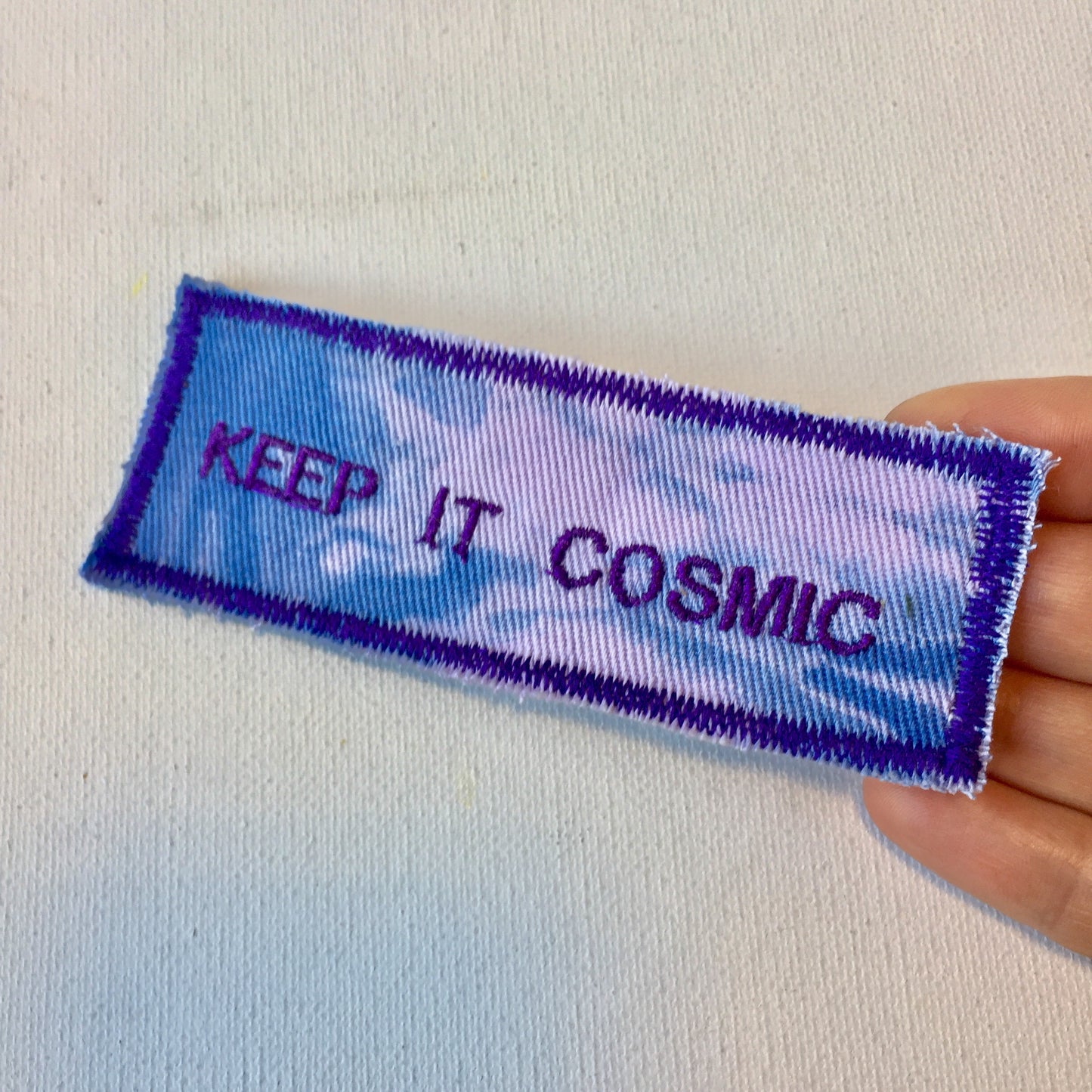 Keep it cosmic! Handmade Embroidered Canvas Patch.