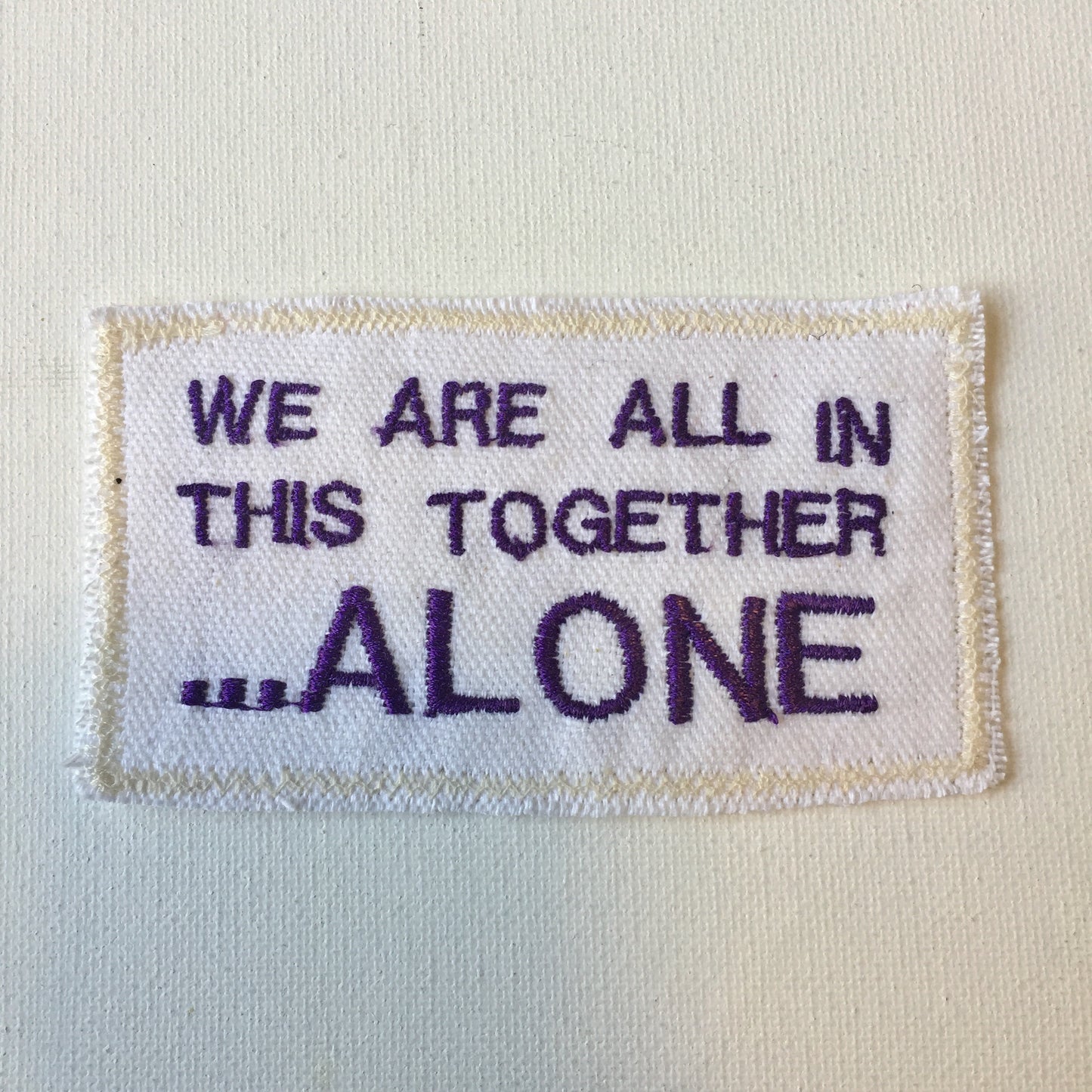 Together, Alone. Handmade Embroidered Canvas Patch.